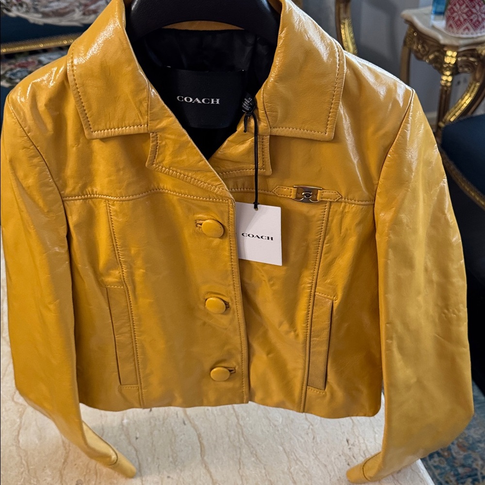 NWT Coach Women's Mustard Patent Leather Jacket. XS. $895
